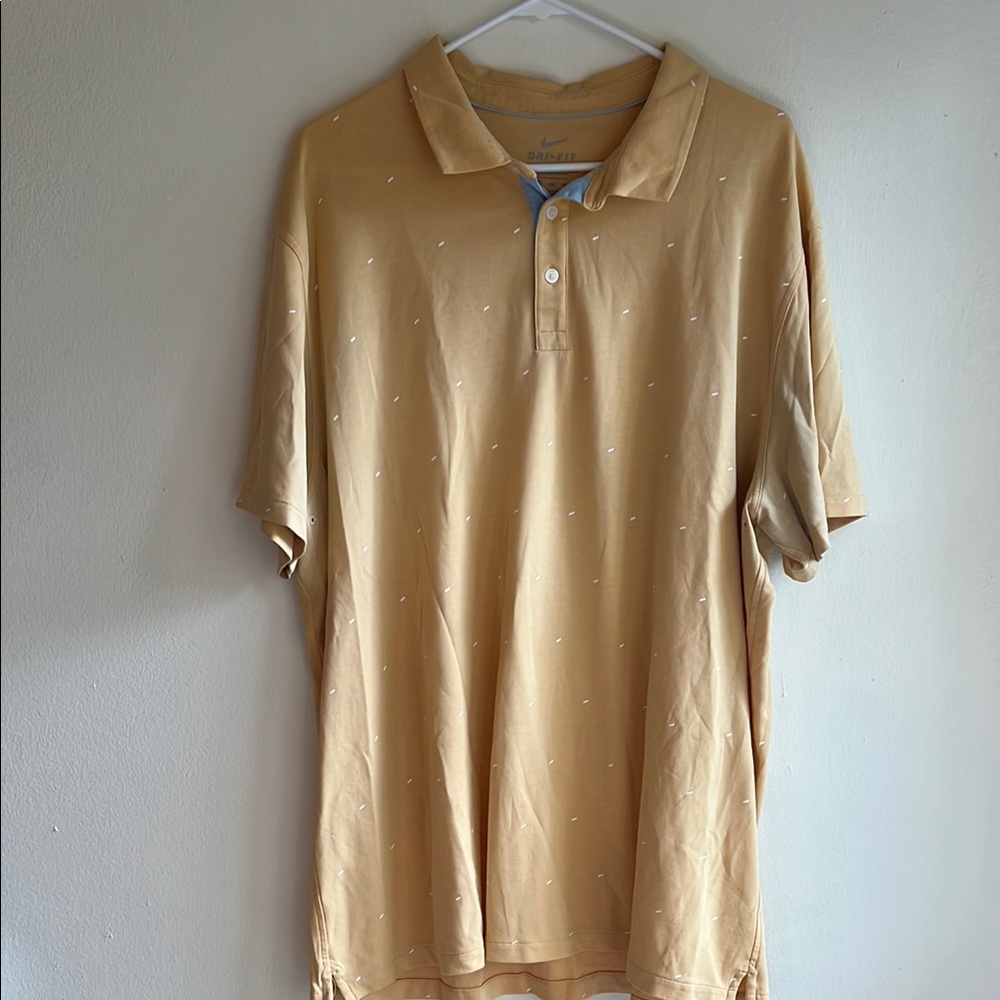 Nike Men's Tan Polo Shirt with Subtle Pattern